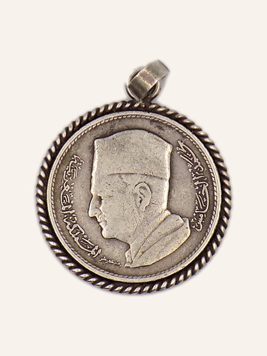 Monnaie marocaine montée en pendentif