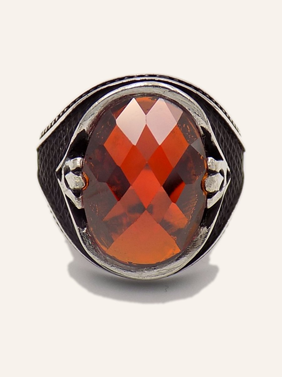 Men's ring with orange cubic zirconia and openwork shoulders