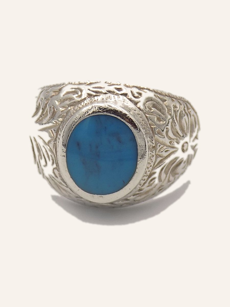Ring with turquoise cabochon and flowered band