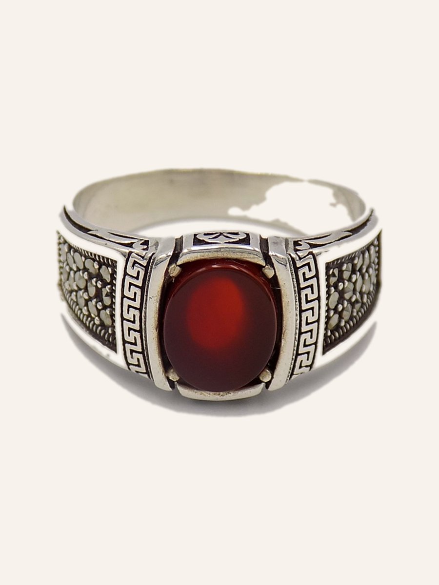 Ring with garnet and Greek key frieze