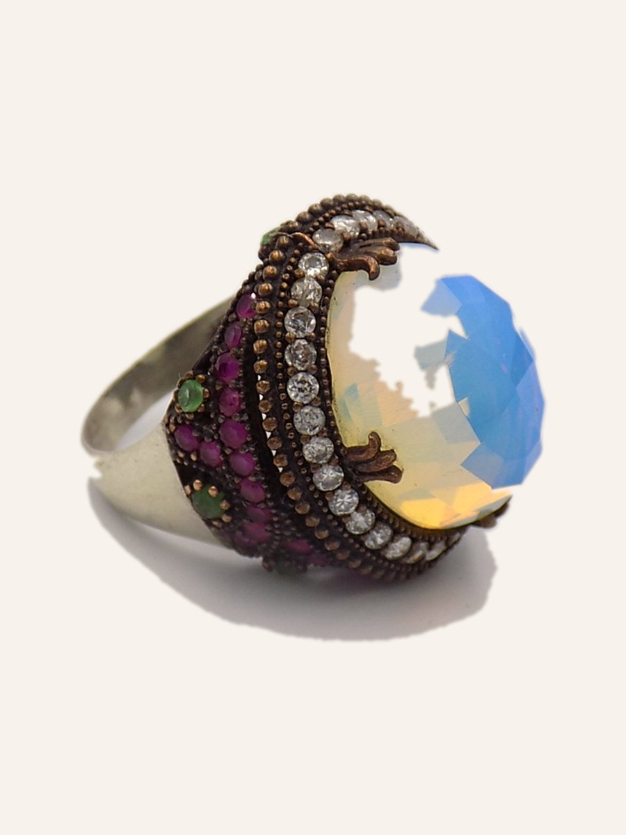 Domed ring with multicoloured stones