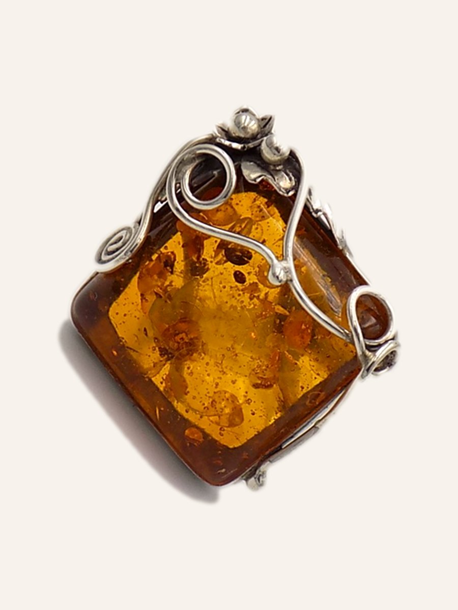 Ring with square amber on a twisted wire