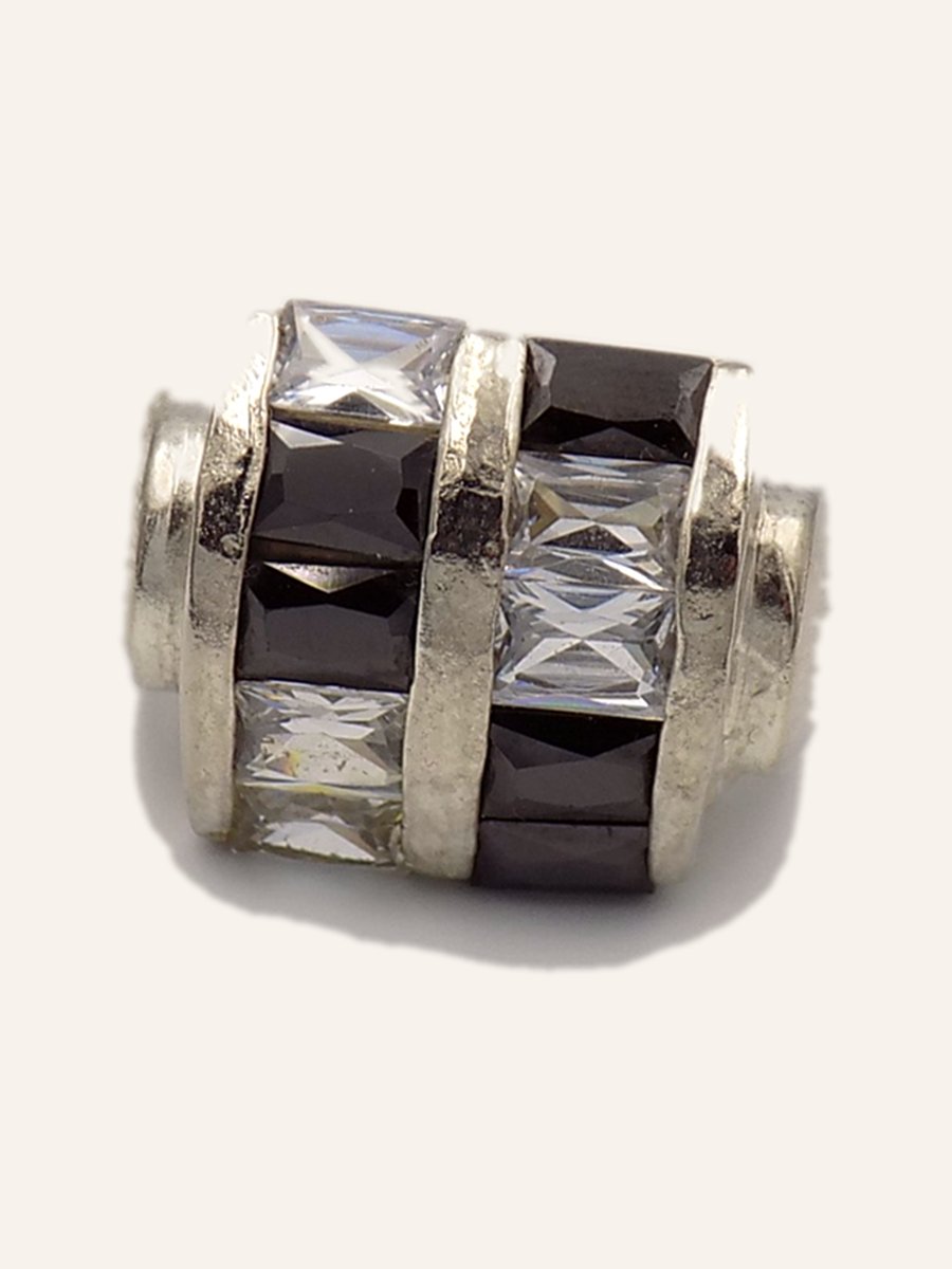 Barrel ring with black and white baguettes