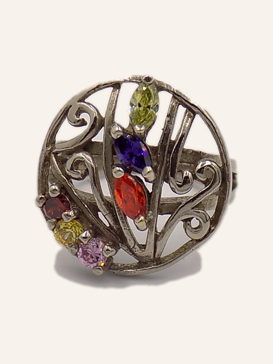 Round openwork ring with coloured stones