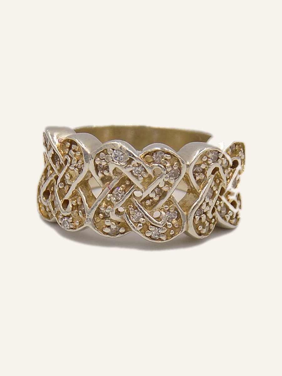 Wide ring with pavé-set interlacing