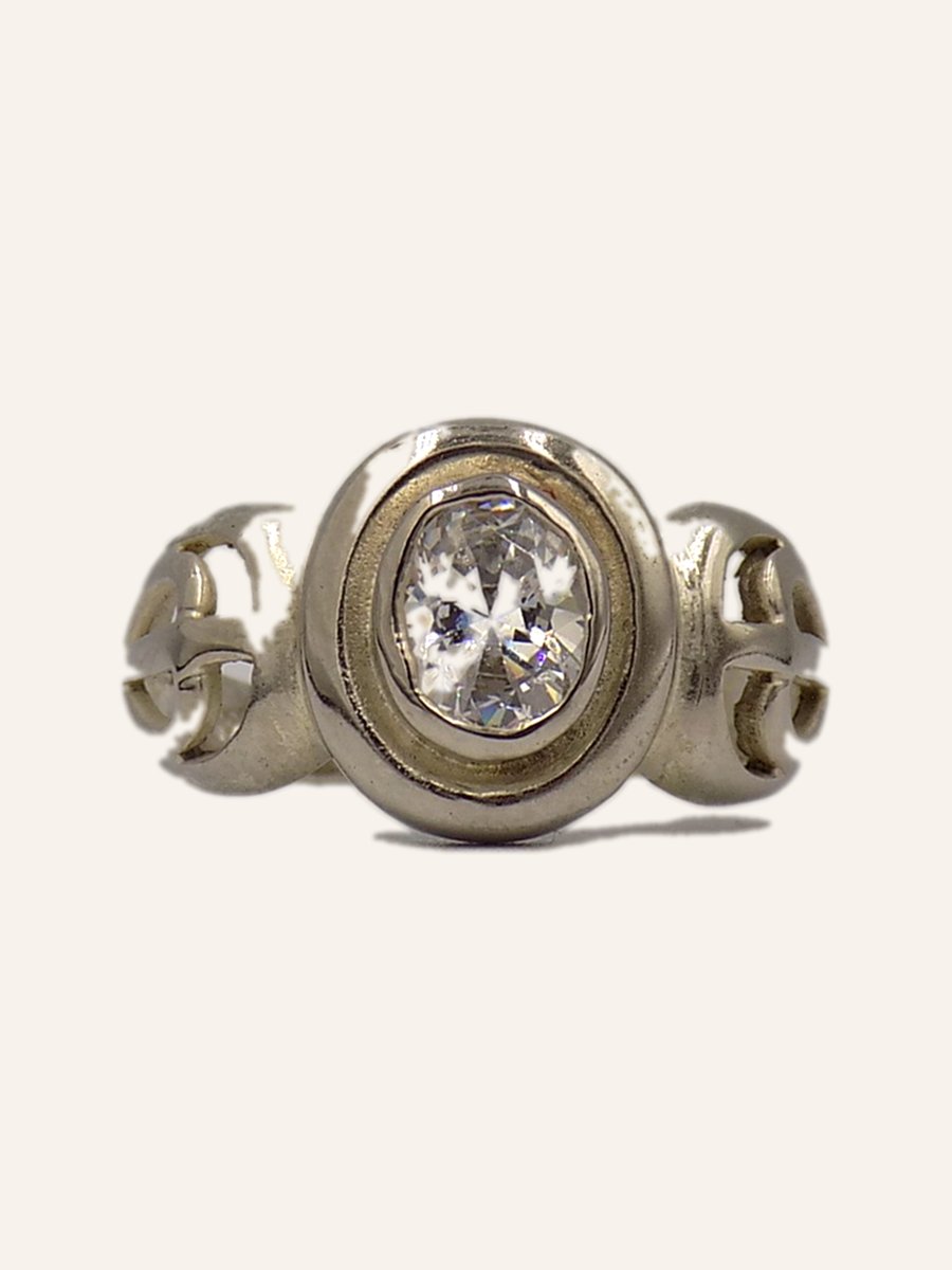 Solitaire ring with cubic zirconia and scrolled shoulders