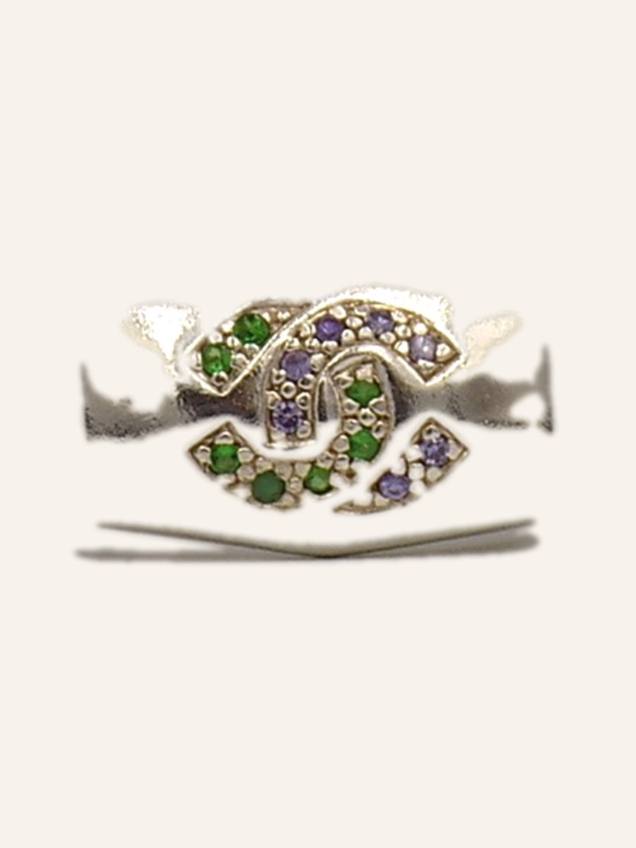 Garland ring with green and purple stones