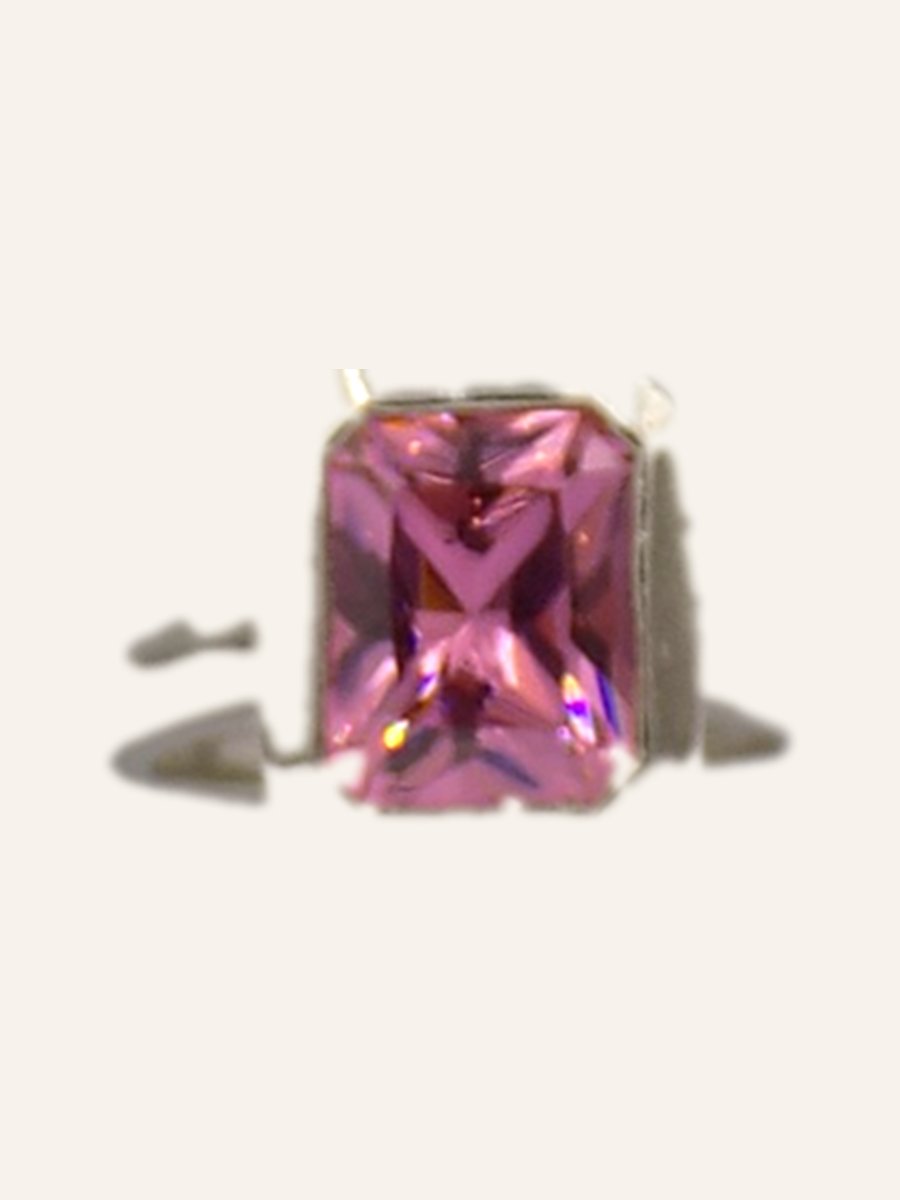 Ring with emerald-cut pink cubic zirconia