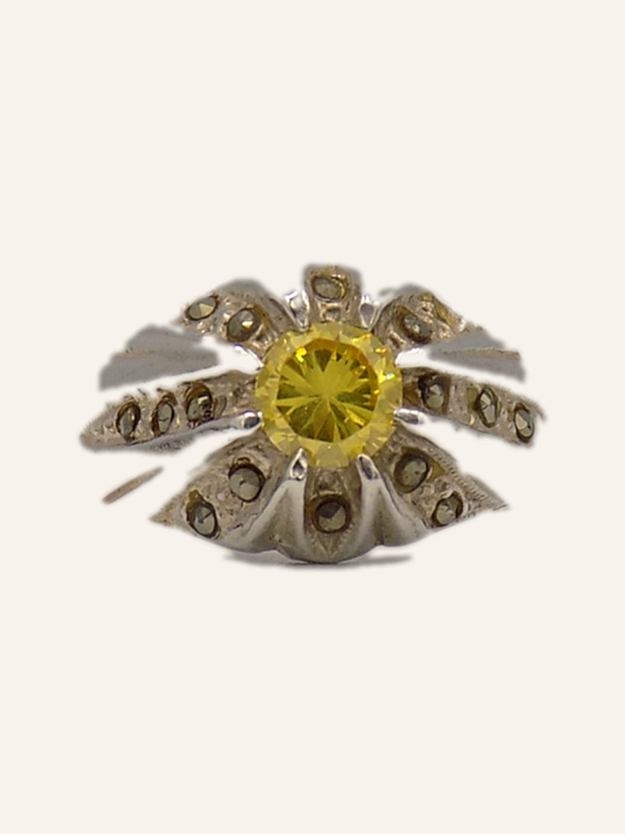 Sun ring with yellow stone and marcasites