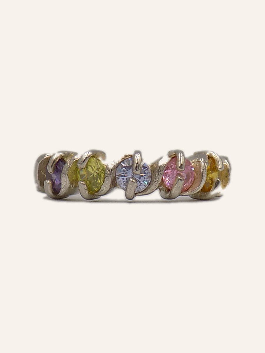 Wedding band with pastel stones