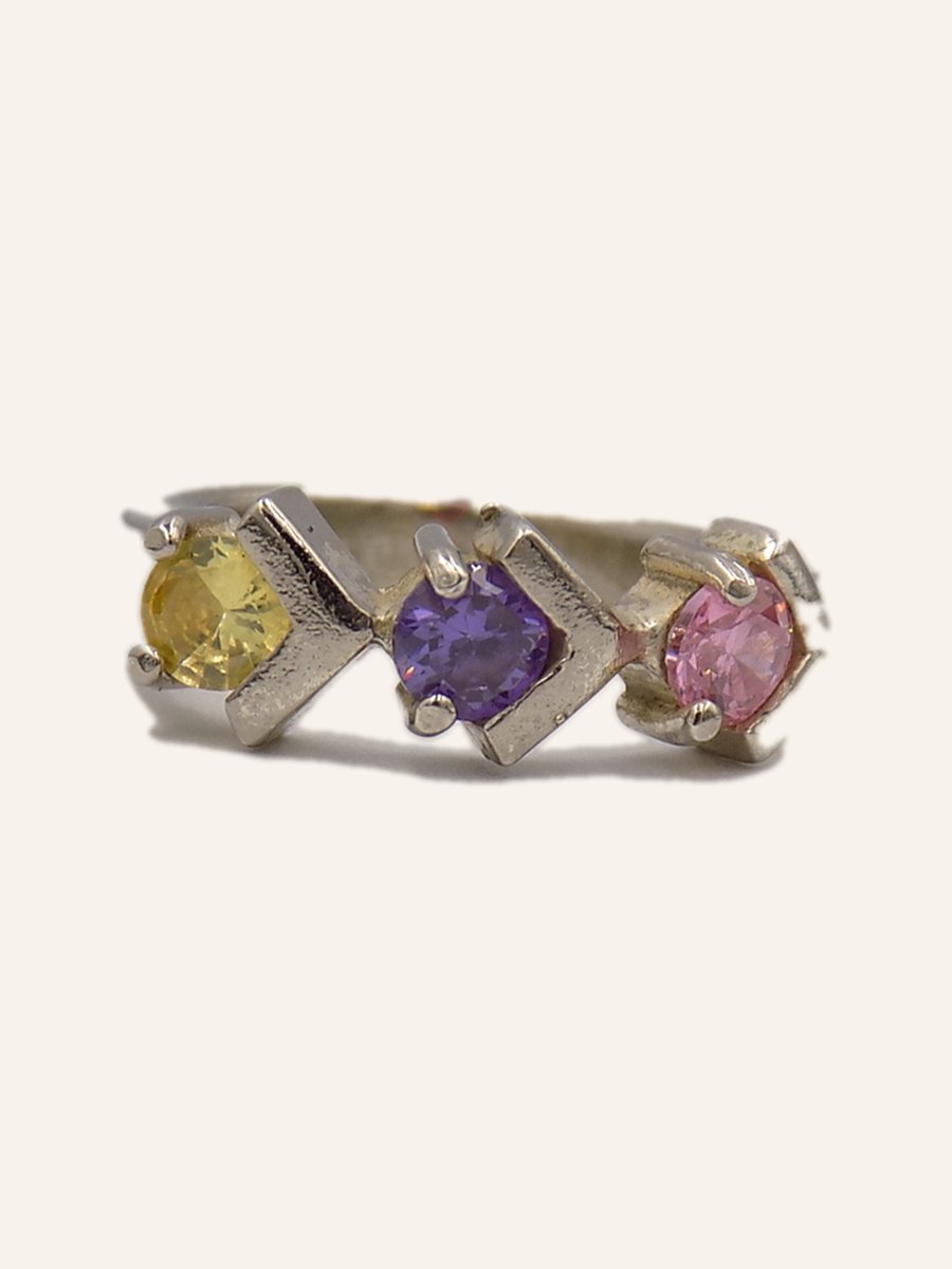 Band ring with claw-set coloured stones