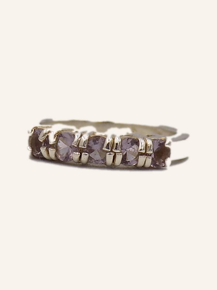 Wedding band with pale amethysts