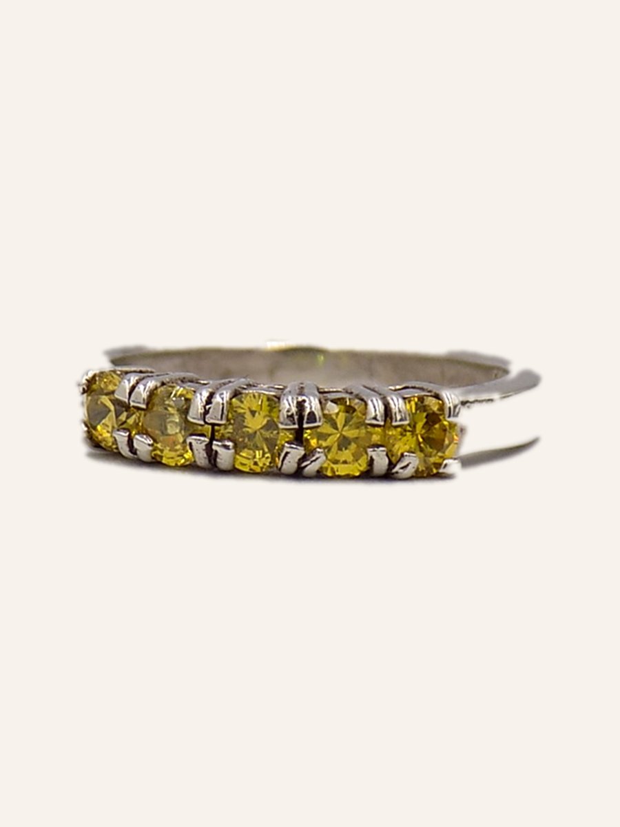 Wedding band with yellow stones