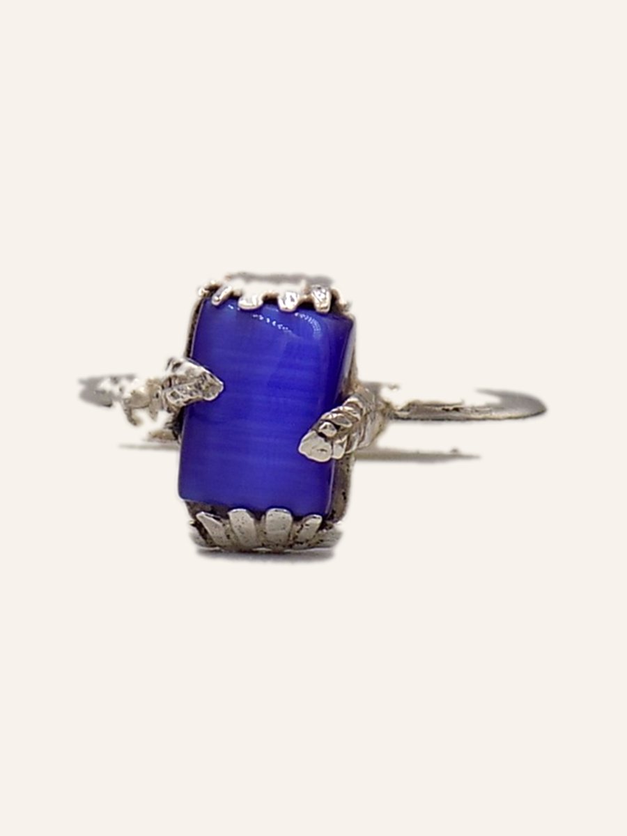 Ring with rectangular blue cabochon