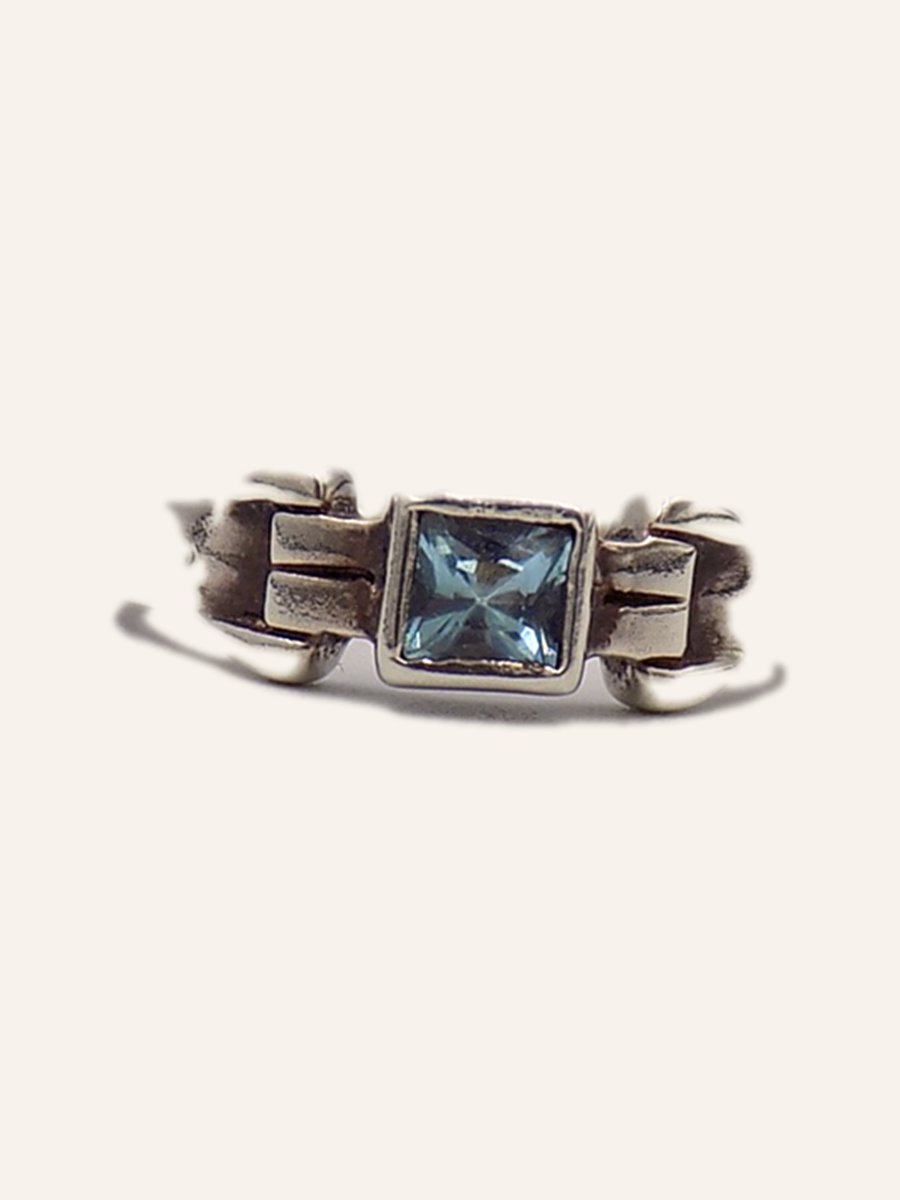 Ring with square blue topaz