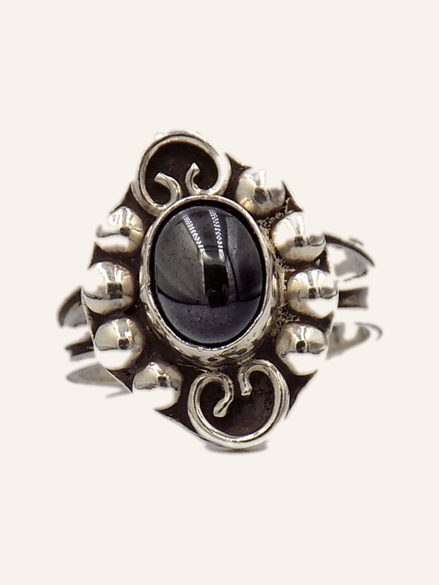 Ring with striped cabochon and silver scrolls