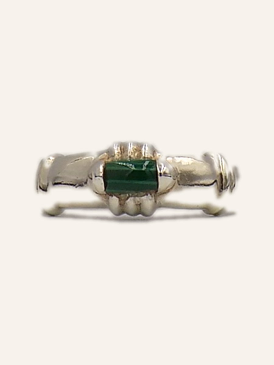 Ring with a band of malachite