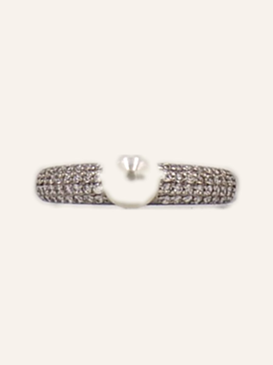 Pavé-set band ring with a central stone