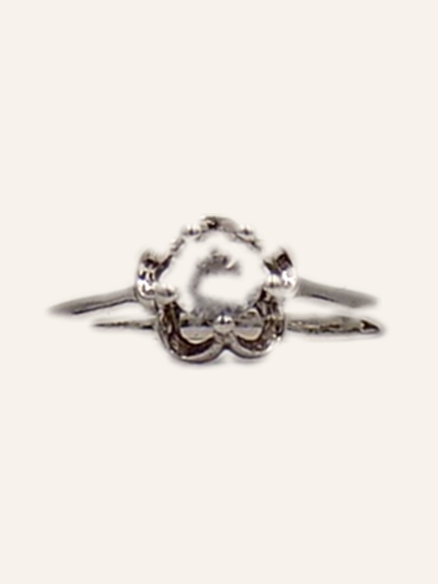 Bague à monture couronne ajourée
