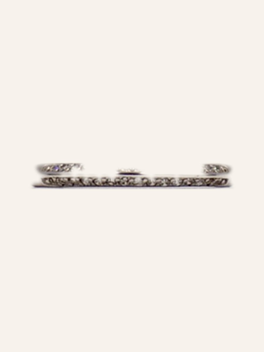Flat wedding band with a row of cubic zirconia
