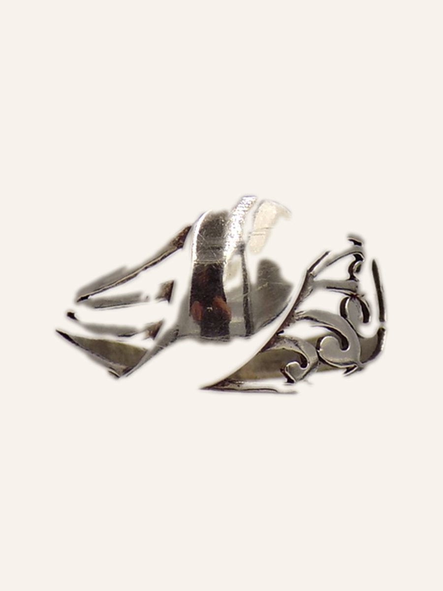 Ring with scrolls and a plain band