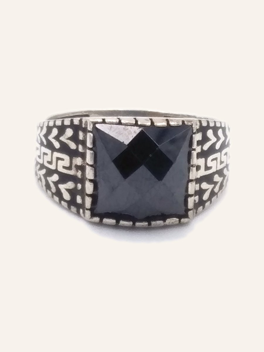 Men's ring with haematite and Berber motifs