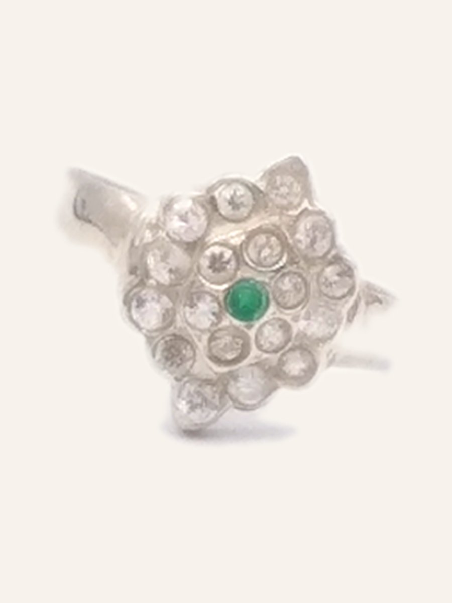 Flower ring with cubic zirconia and a green stone