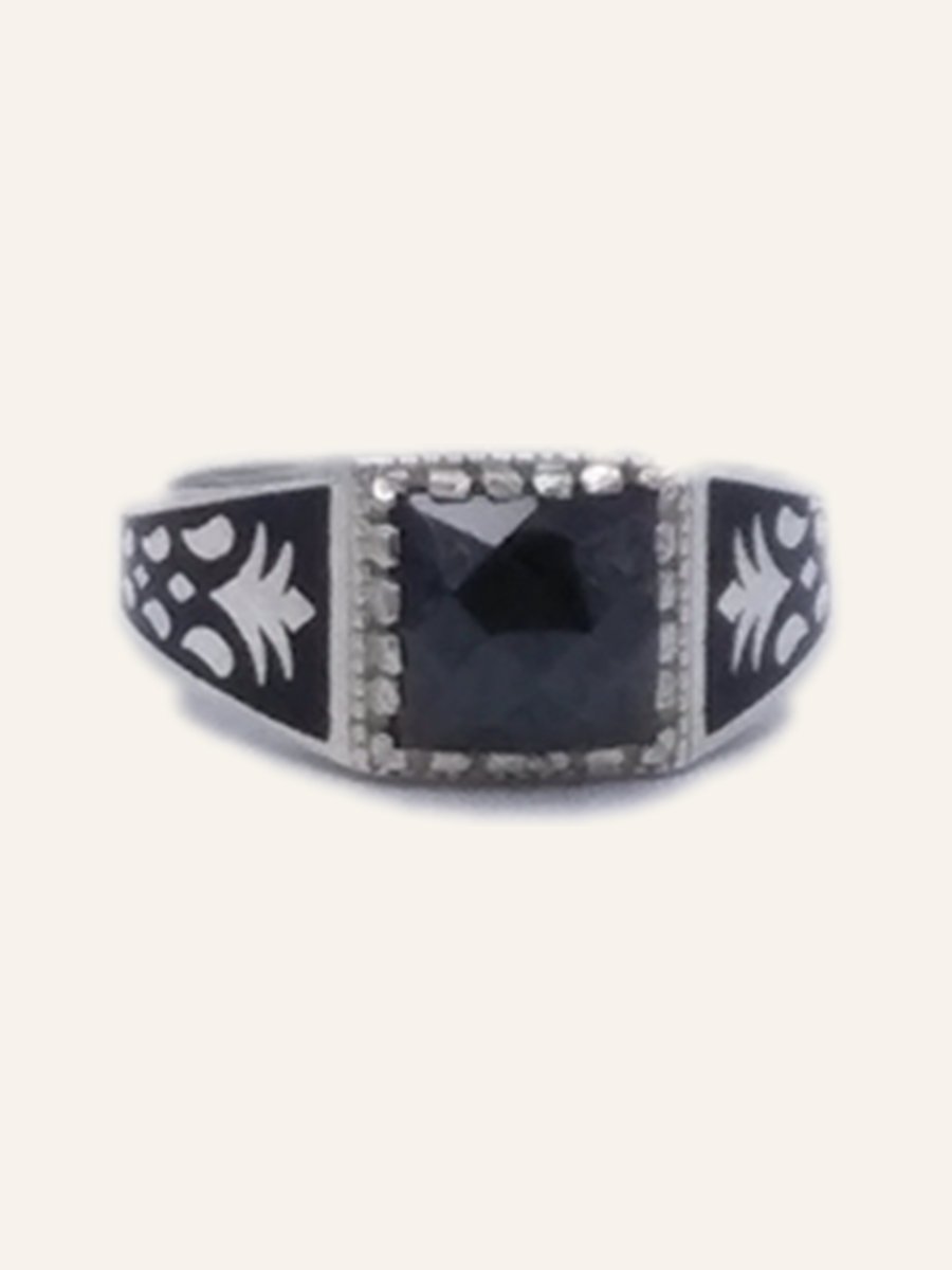 Men's ring with faceted onyx and palmettes