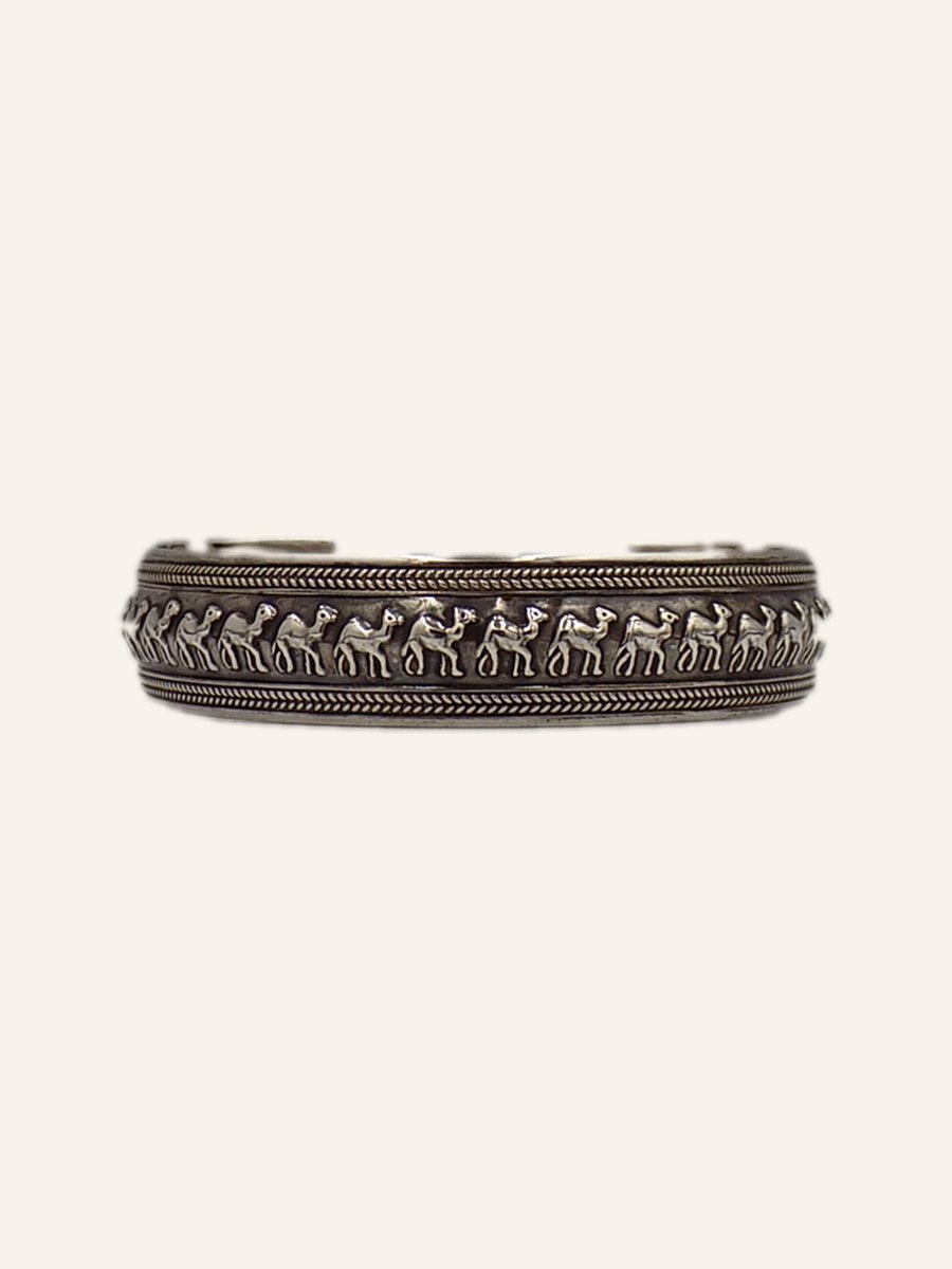 Cuff with engraved frieze and beads