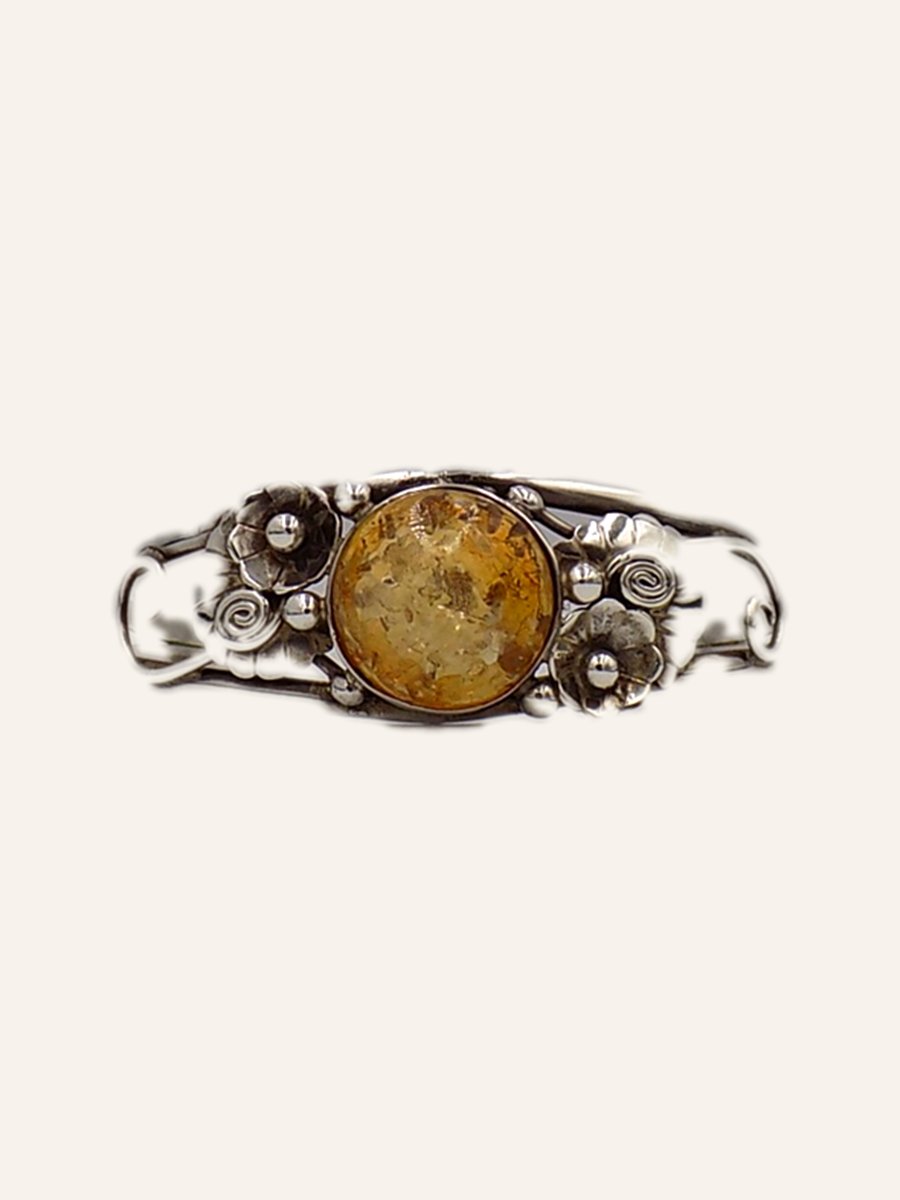 Bangle with amber and chased branches