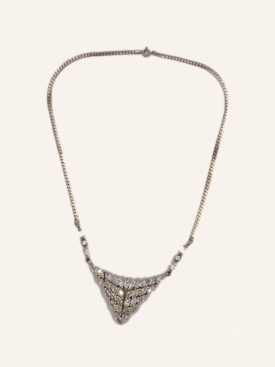 Necklace with triangular openwork bib