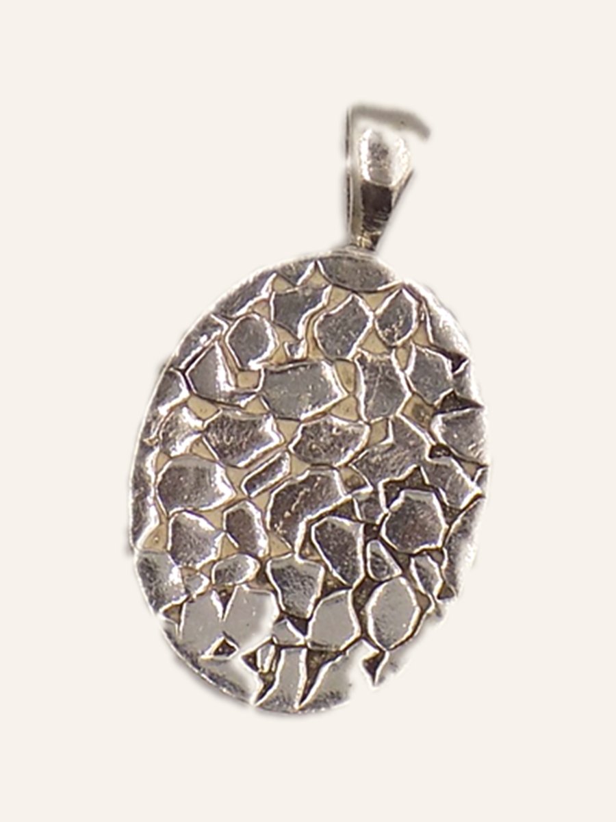 Oval pendant with hammered texture