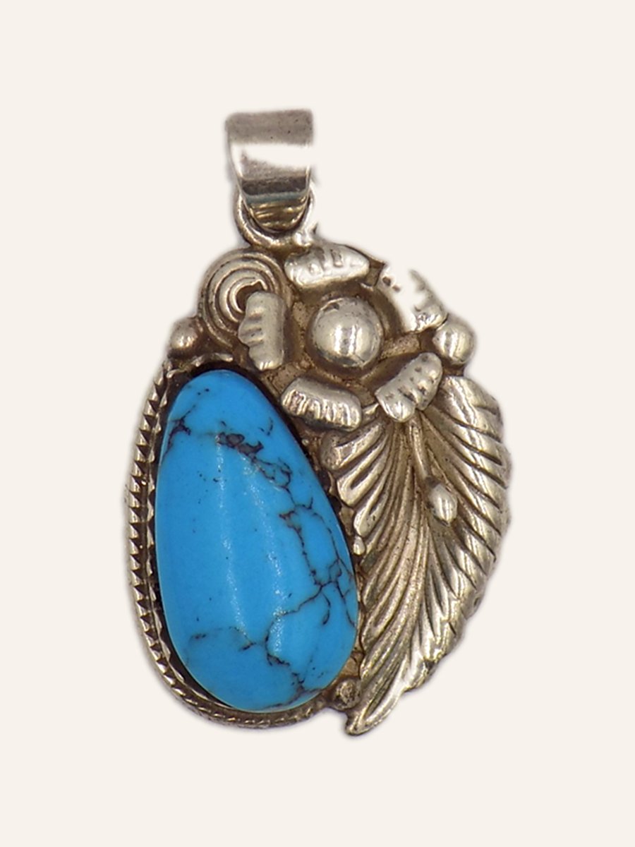 Pendant with turquoise and chased foliage