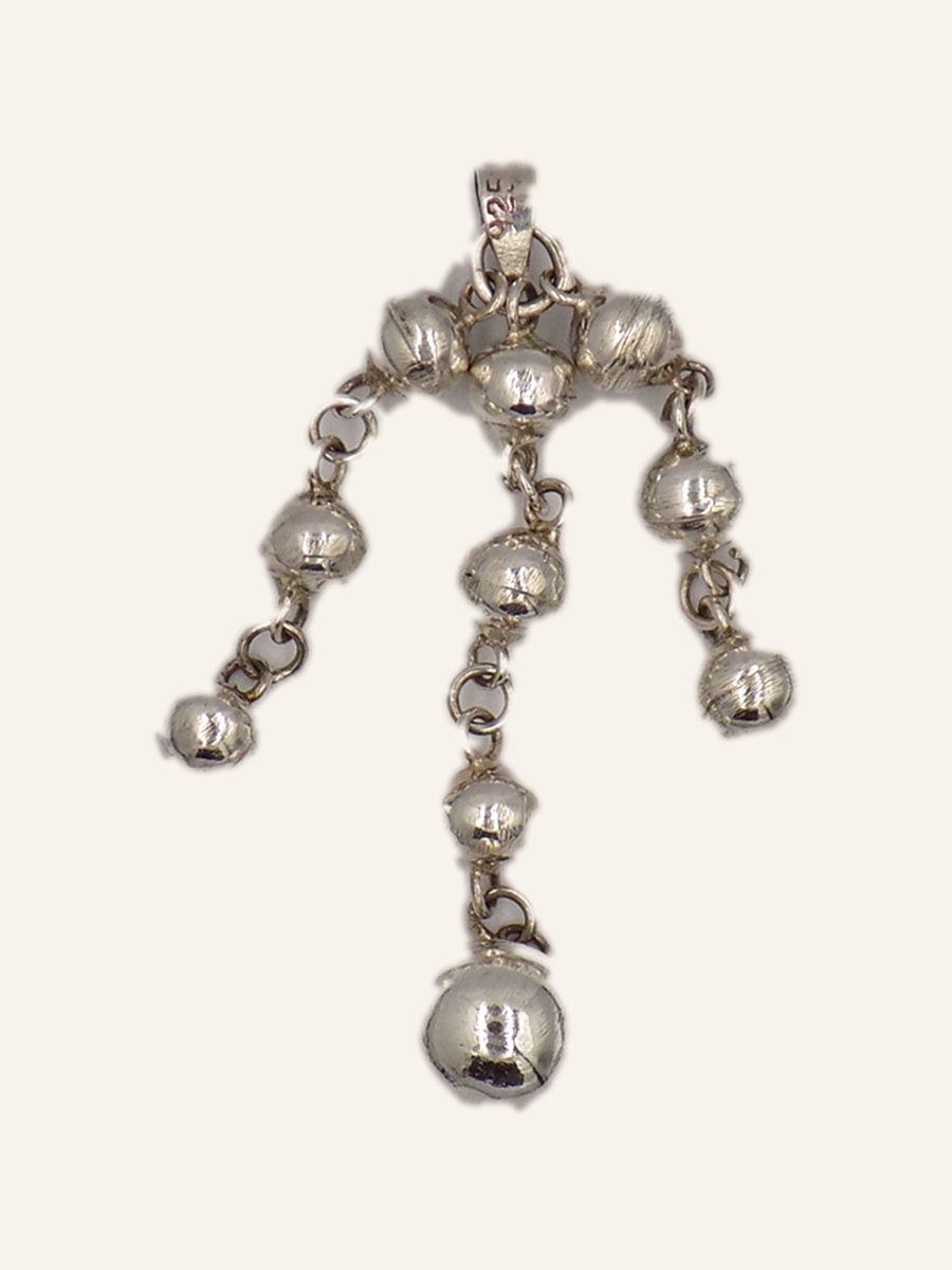 Pendant with a cascade of beads
