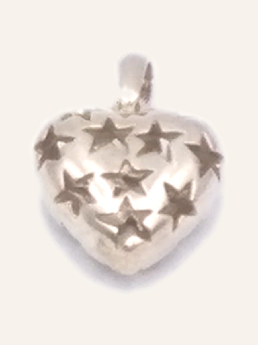 Domed heart pendant with stars