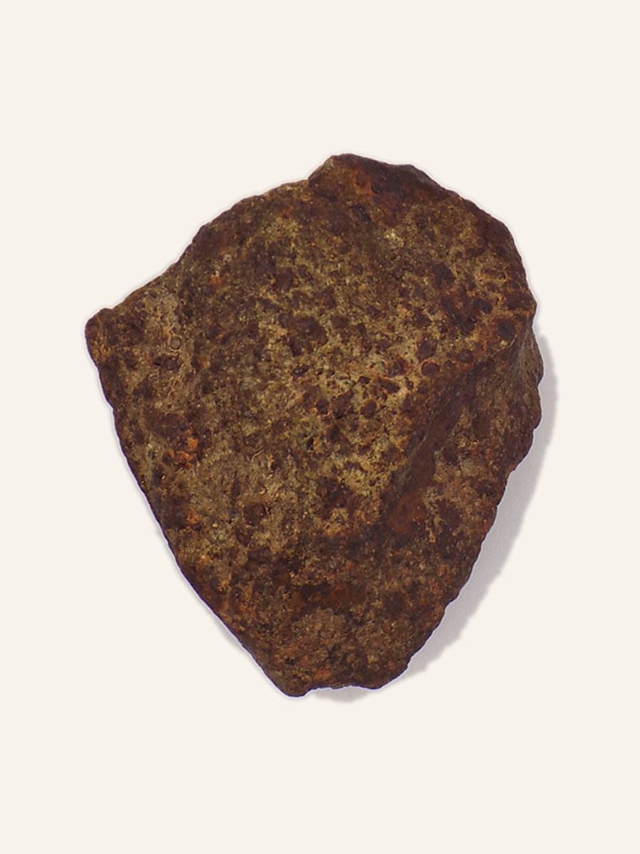 Unclassified meteorite, russet crust