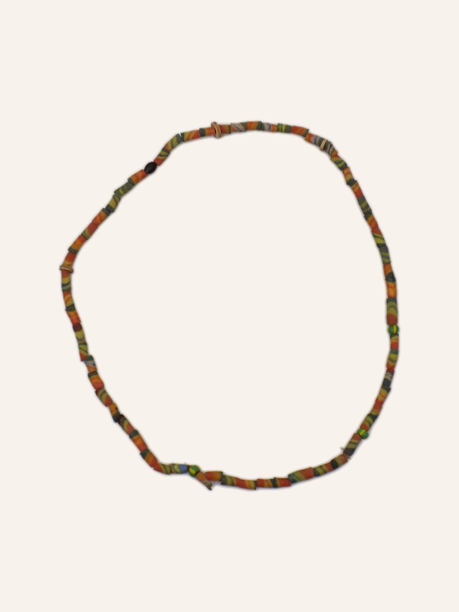 Necklace of trade beads, green ground