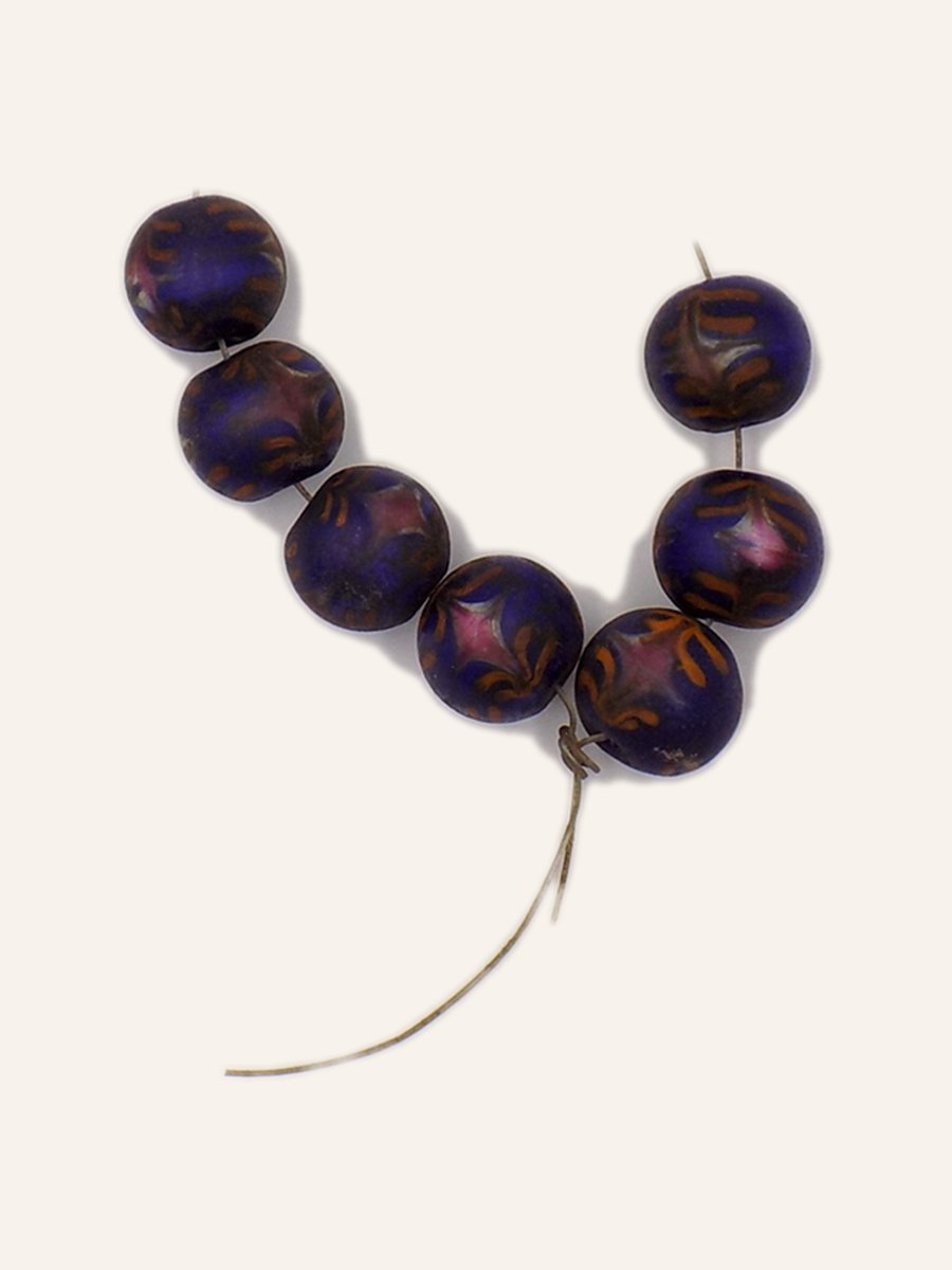 Five large dark beads
