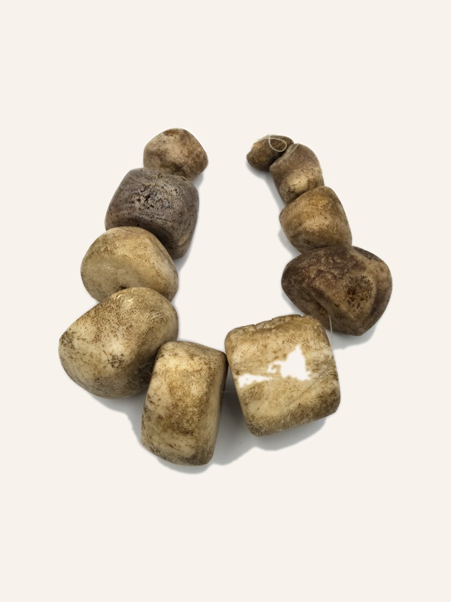 Pale stone beads, strung lot